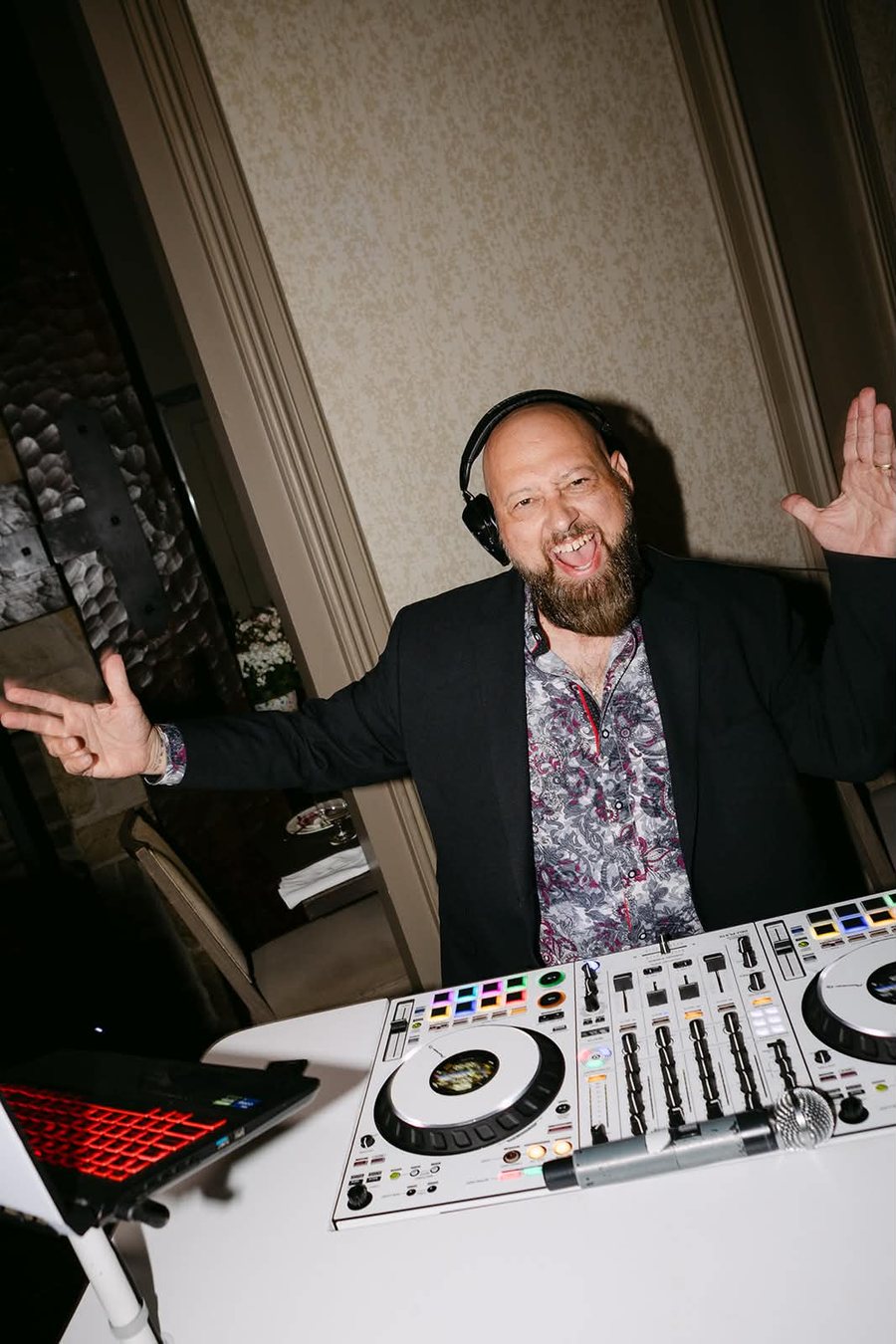 Joe behind the DJ decks at a celebration