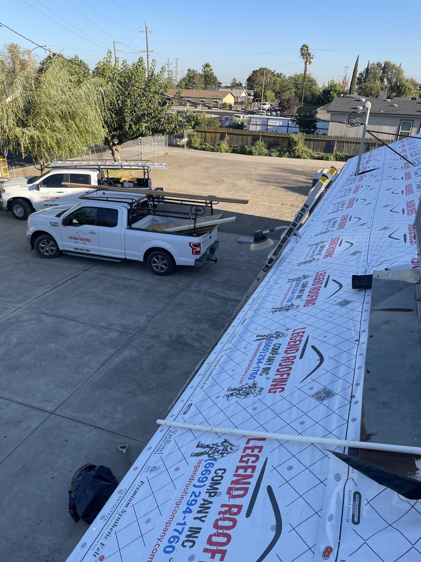 Legend Roofing trucks and branded underlayment