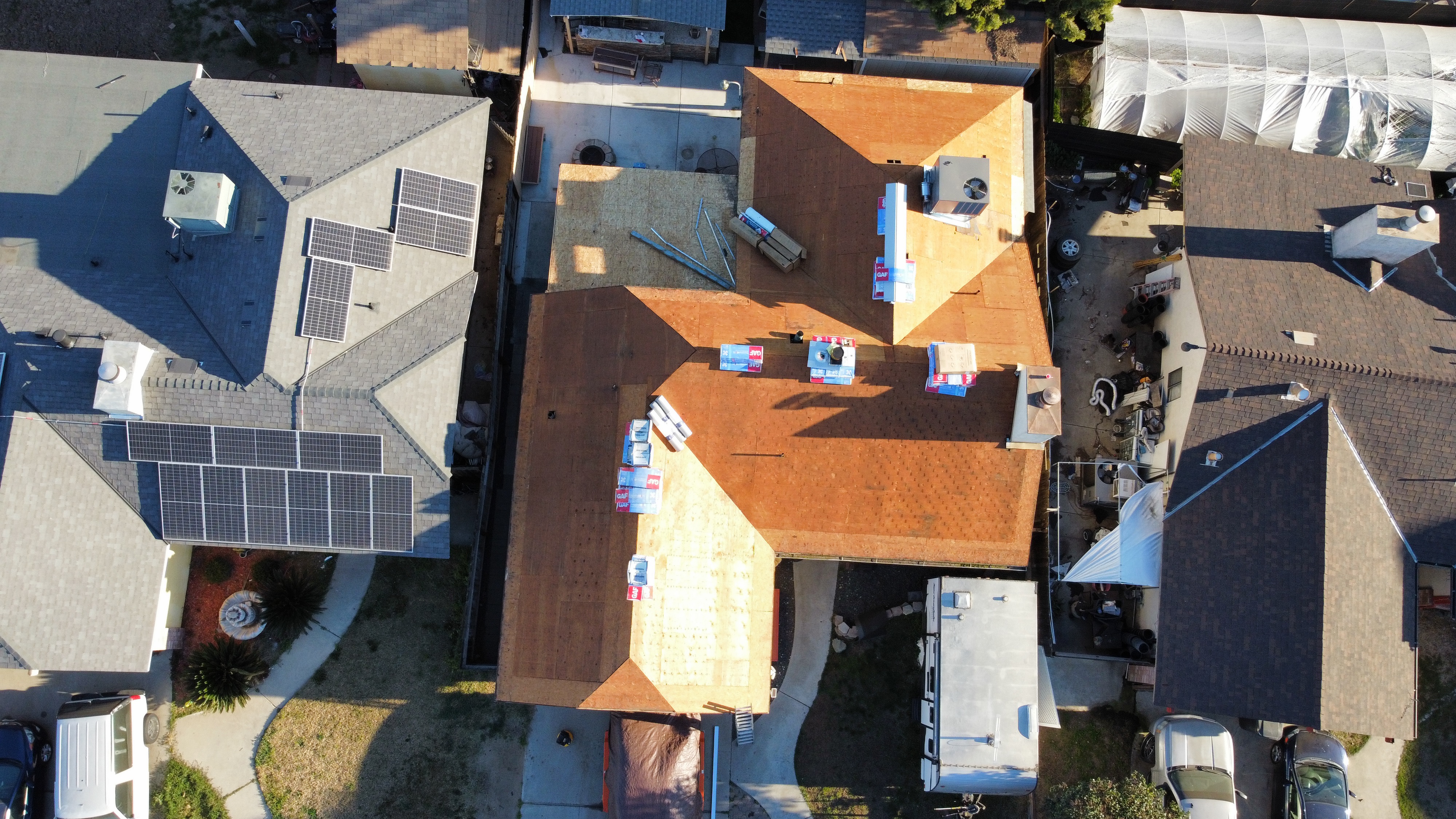 Tear-off in progress on a Legend Roofing job