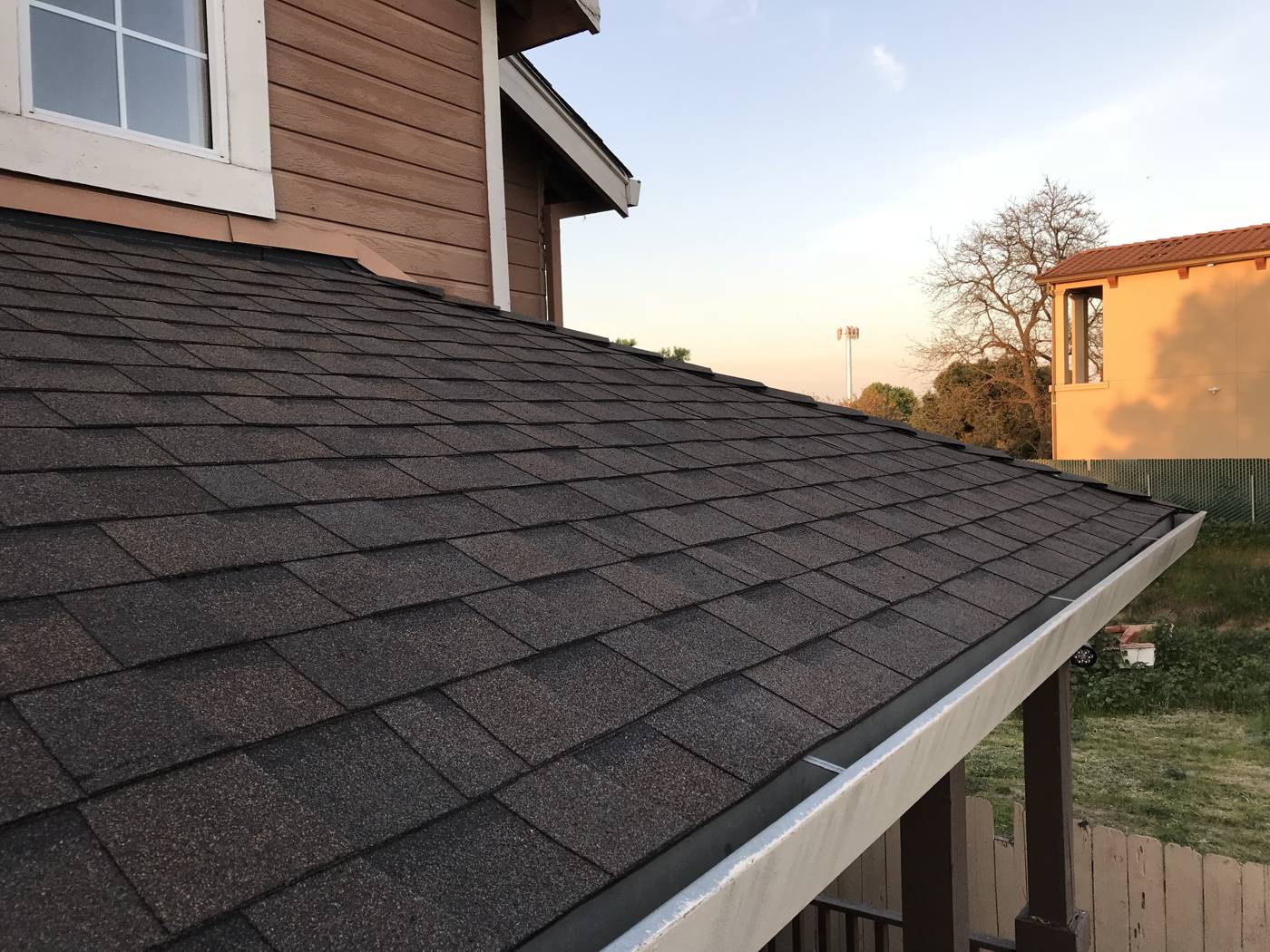 Shingles and white gutter detail