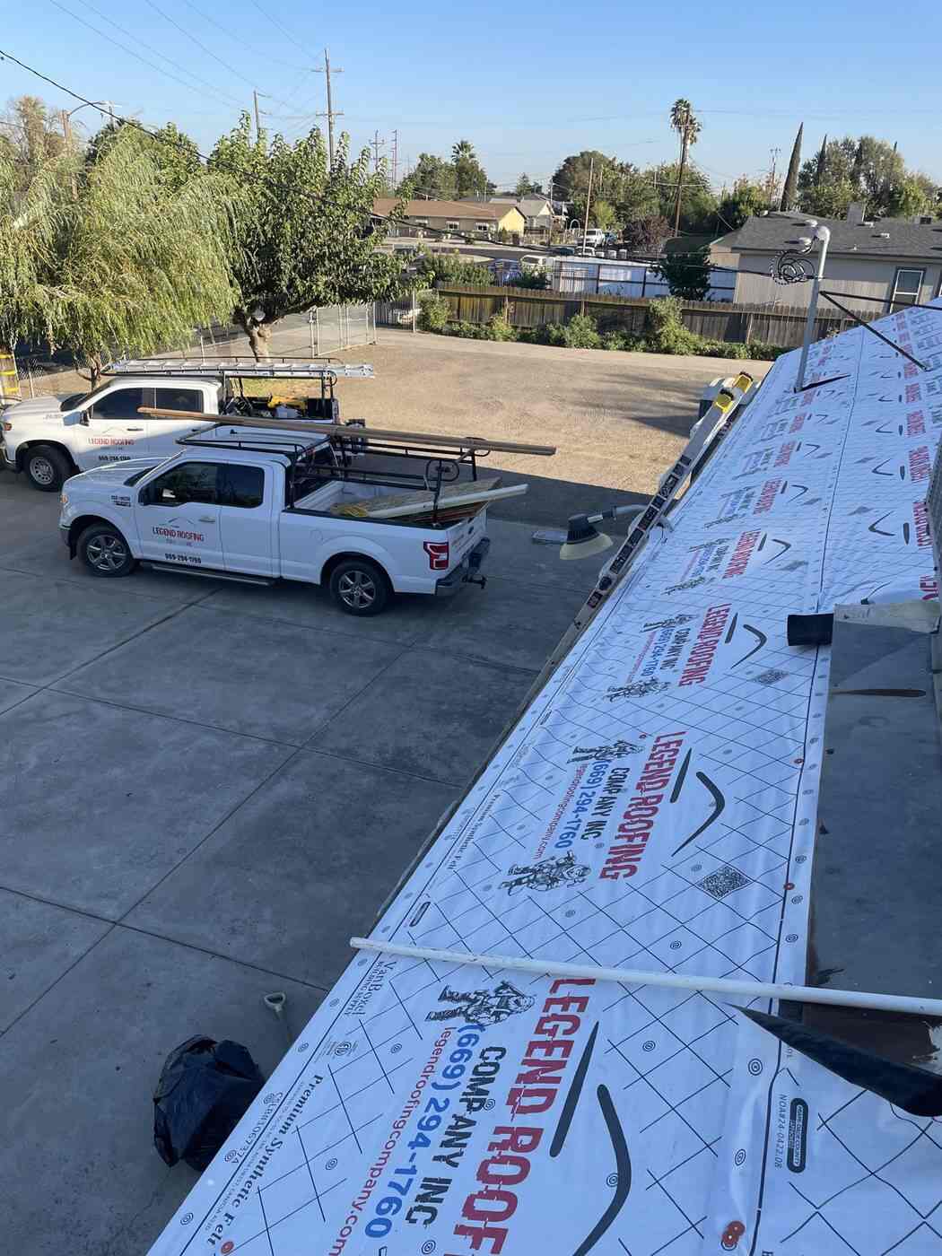 Legend Roofing trucks and branded underlayment