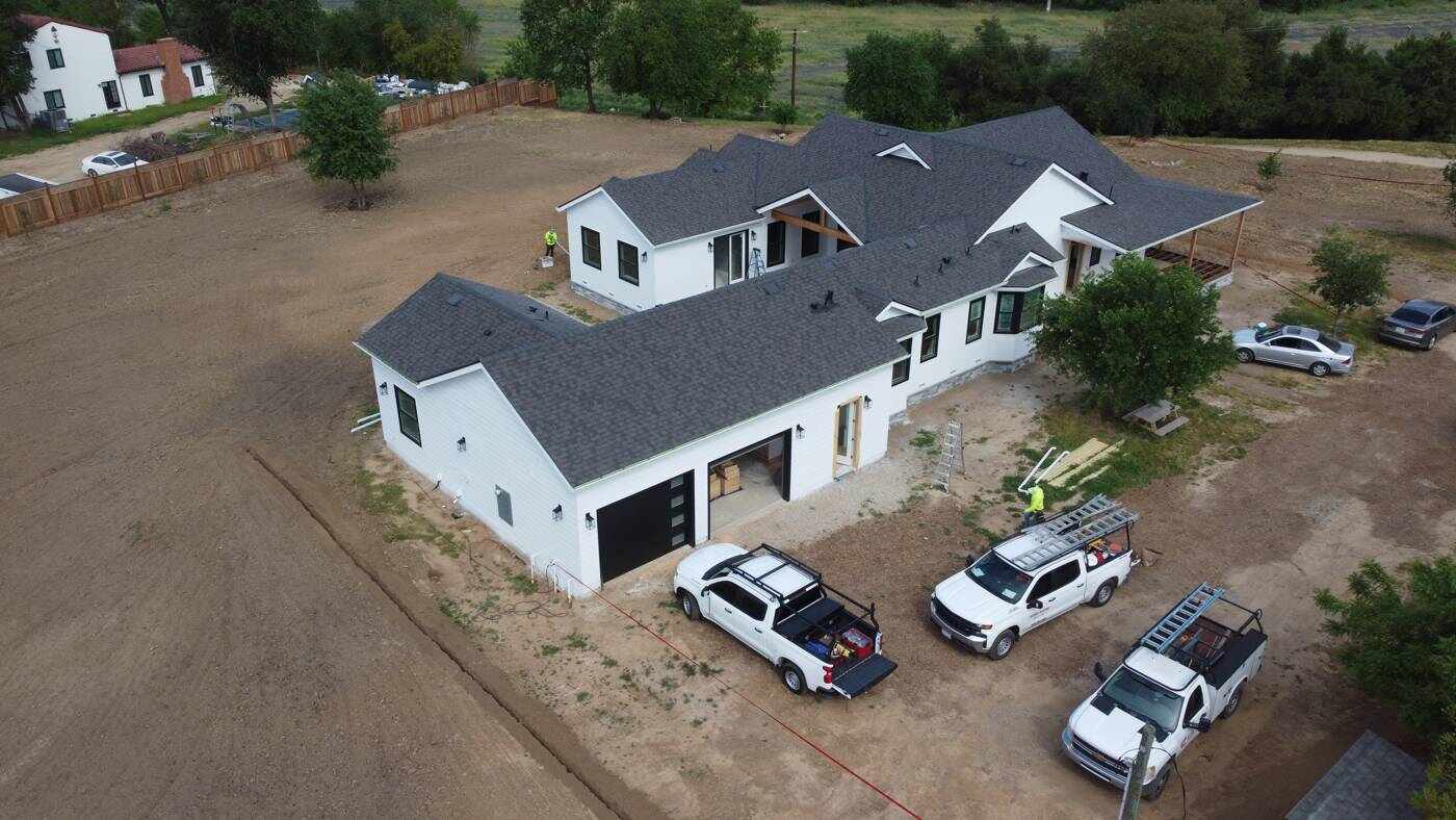 Finished white home roof aerial