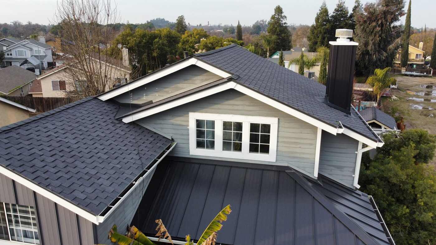 Finished shingle and standing seam roof