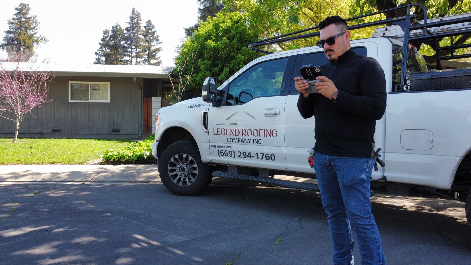 Legend Roofing Company Inc truck and drone inspection in Modesto
