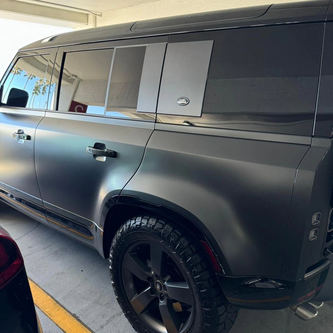 Show Car Quality technician installing window tint in Glendora, CA