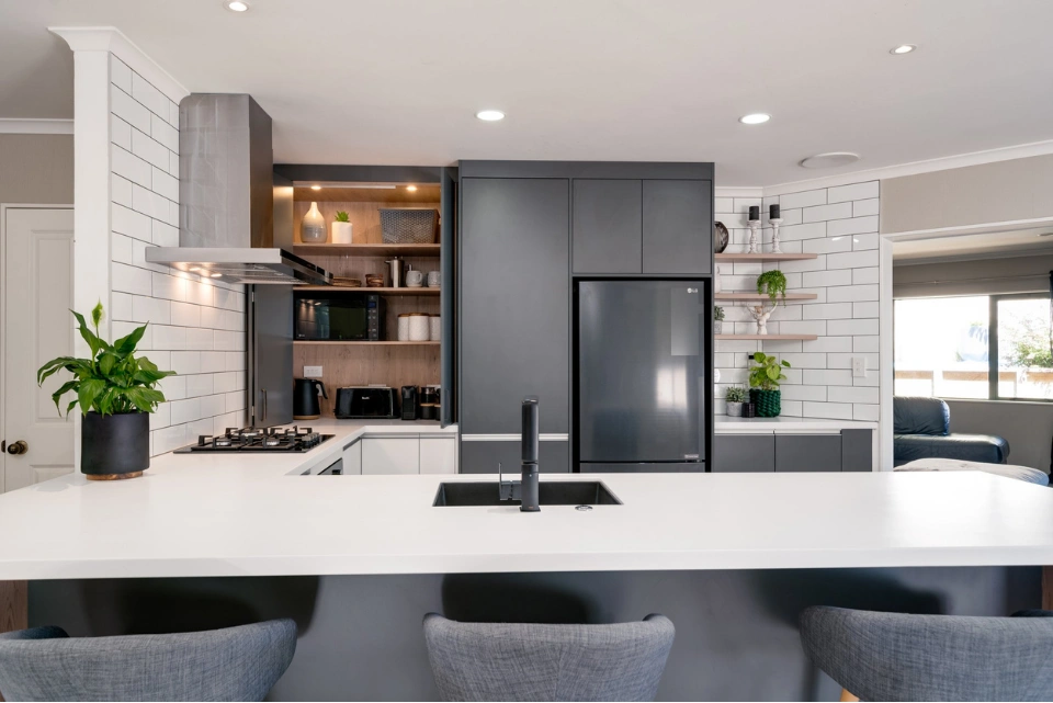 Functional family kitchen layout by Tauranga kitchen designer