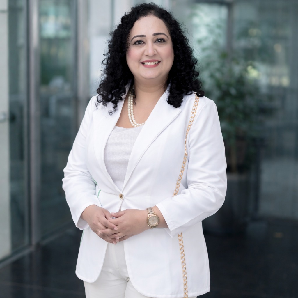 Placeholder image - replace with a photo of Dr. Meenakshi Kumar in warm light with her book