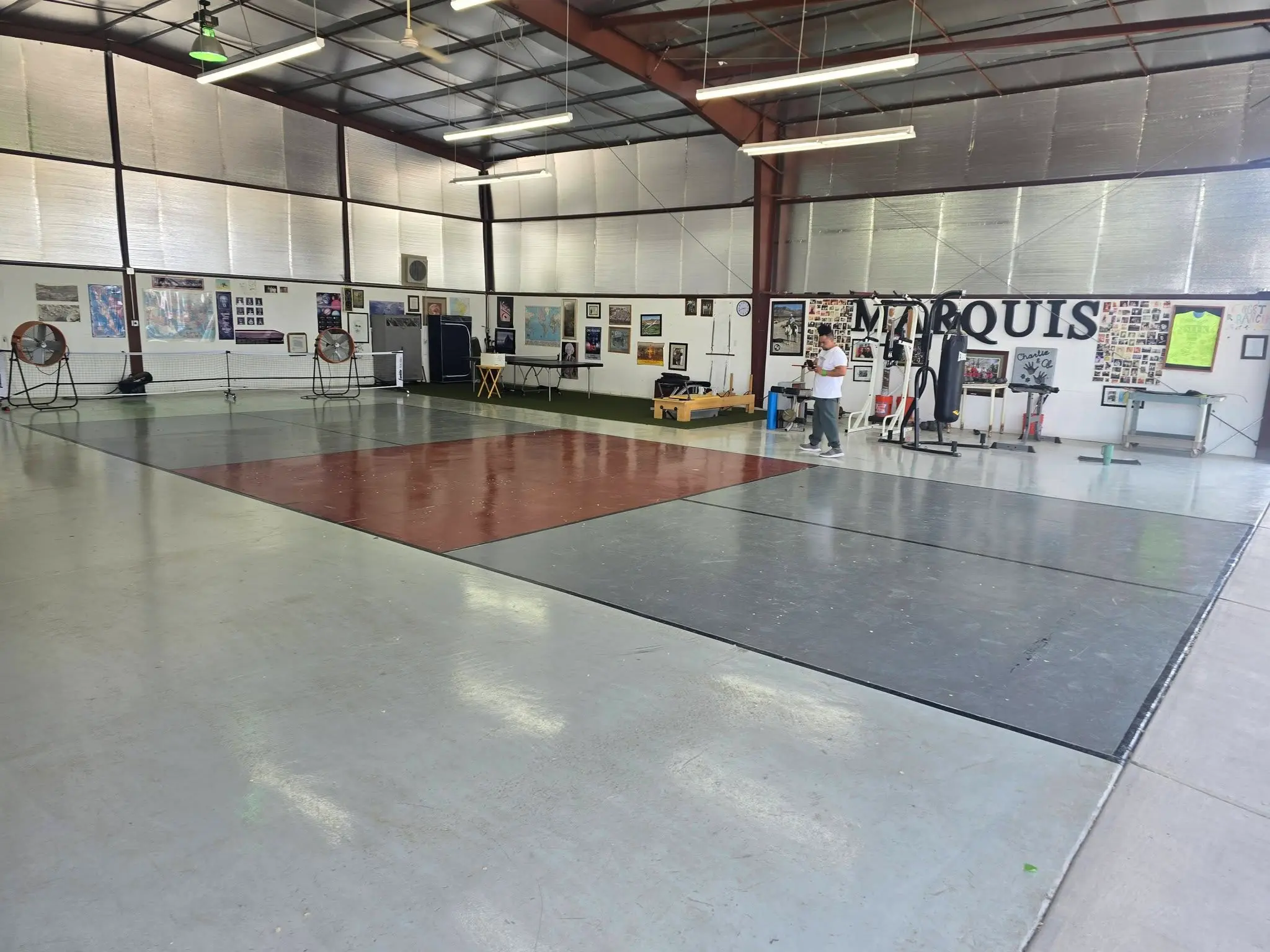 from slick epoxy to Acrytech coating in a airplane hanger 