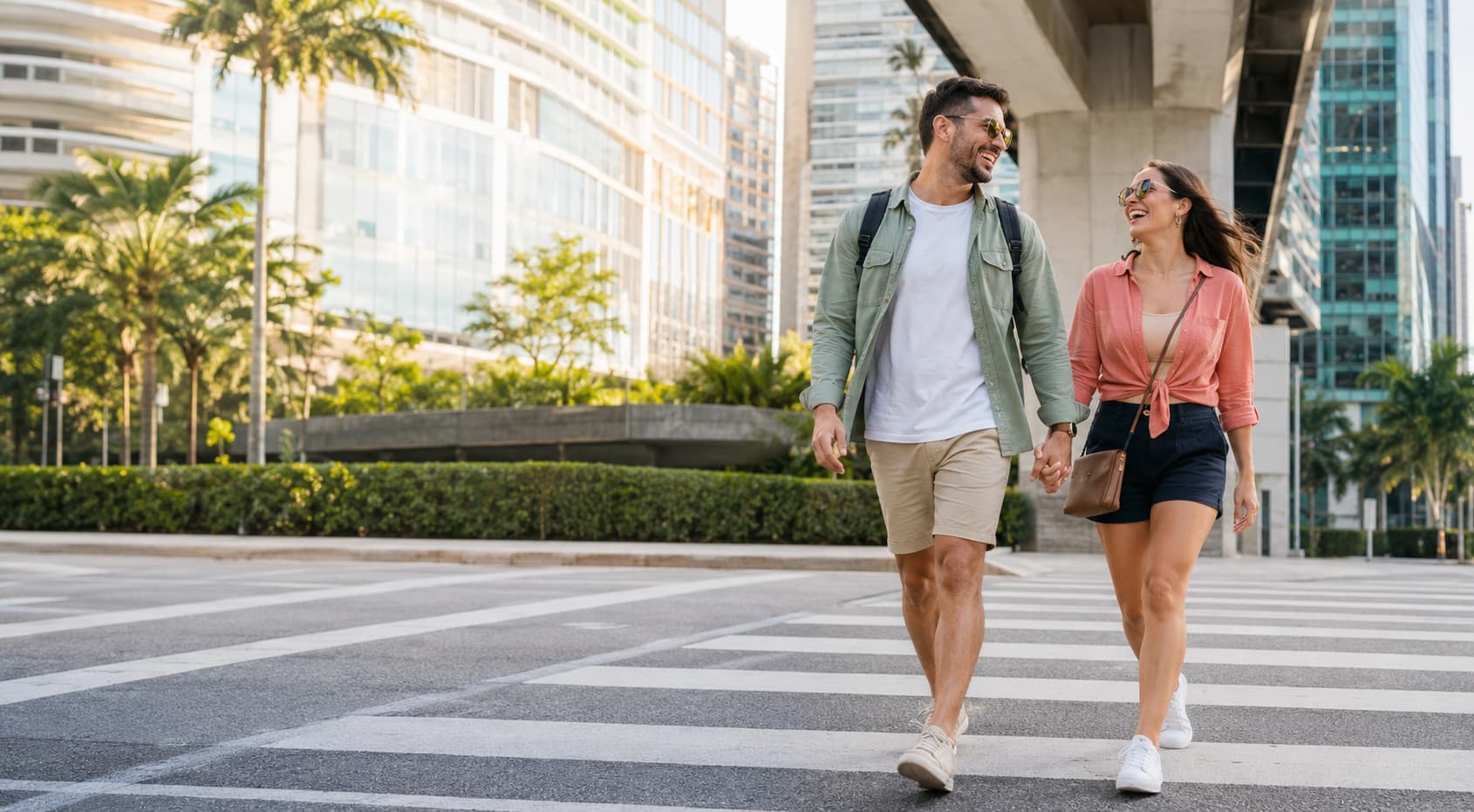 A couple crossing a street in Miami
