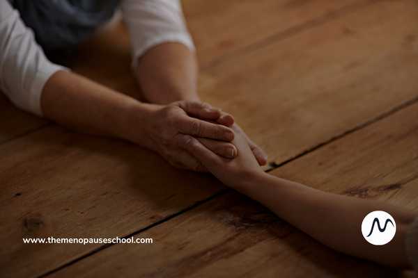hands linked in support