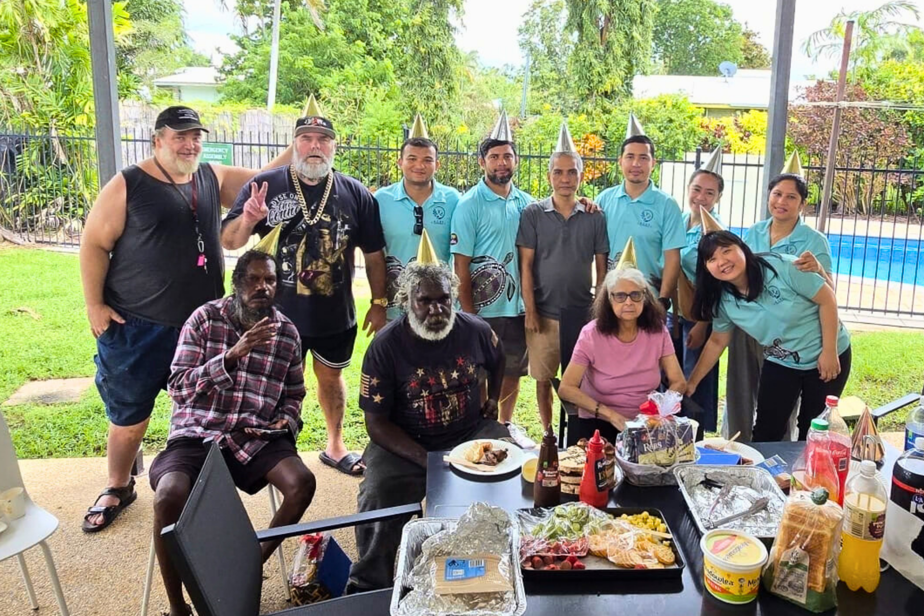 ACRS Community Services participants and team members celebrating a birthday together at our SIL home in Darwin