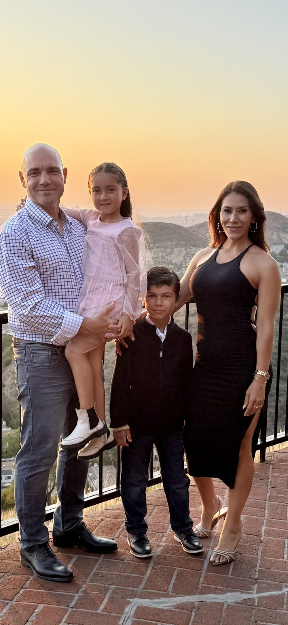 Liz with her husband and kids