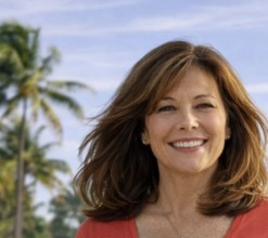 Jeanette Eberhardt, Founder and CEO of Avenue Twenty Media, smiling in a professional setting.