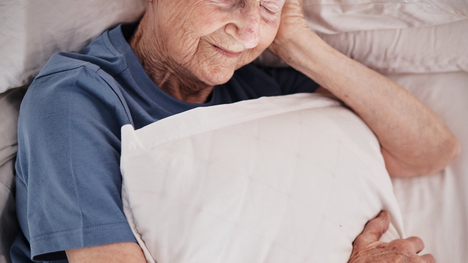 Older woman resting with her eyes closed