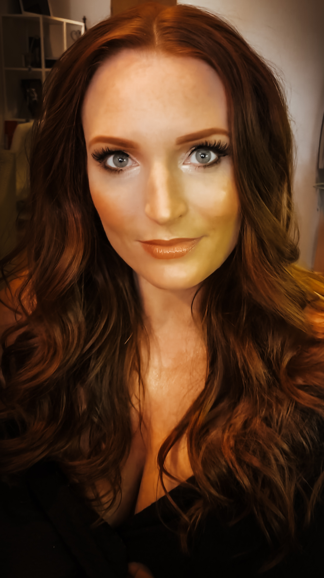 Professional hair and makeup before a boudoir photoshoot