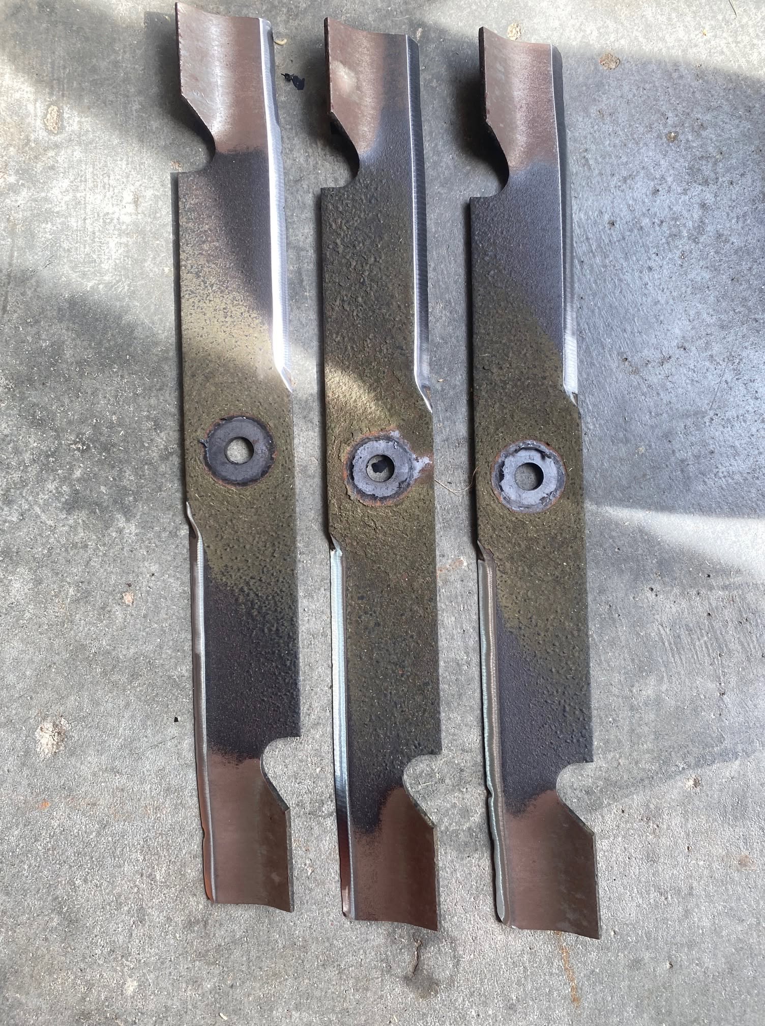 Sharpened mower blades ready for service