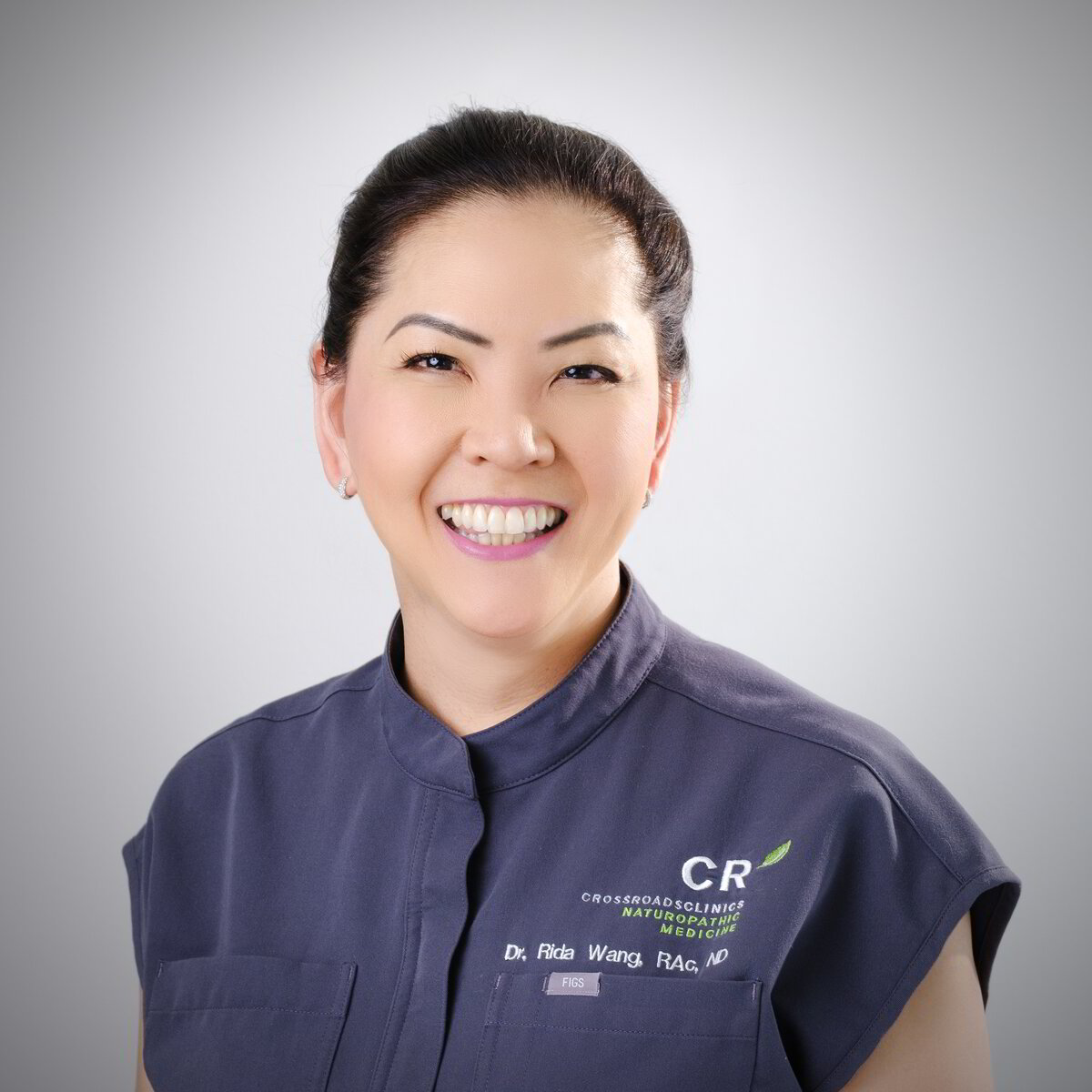 Portrait of Dr. Rida Wang, ND, RAc.