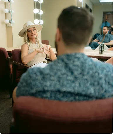 Backstage moment between attendees