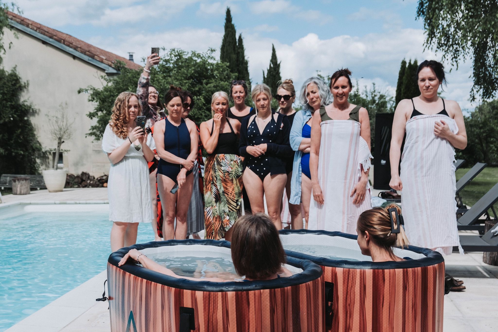 Group around a plunge pool in France