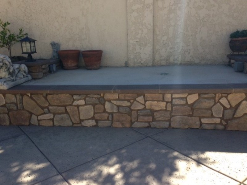 Modern outdoor kitchen with sleek concrete countertops
