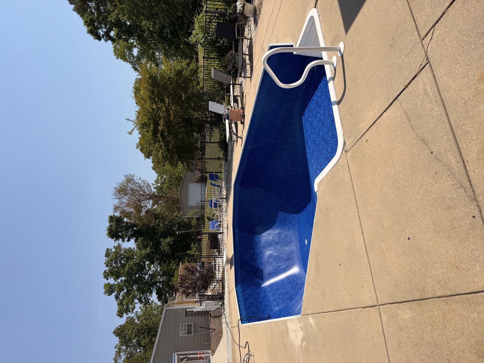 New vibrant blue vinyl pool liner after installation in Durham NC