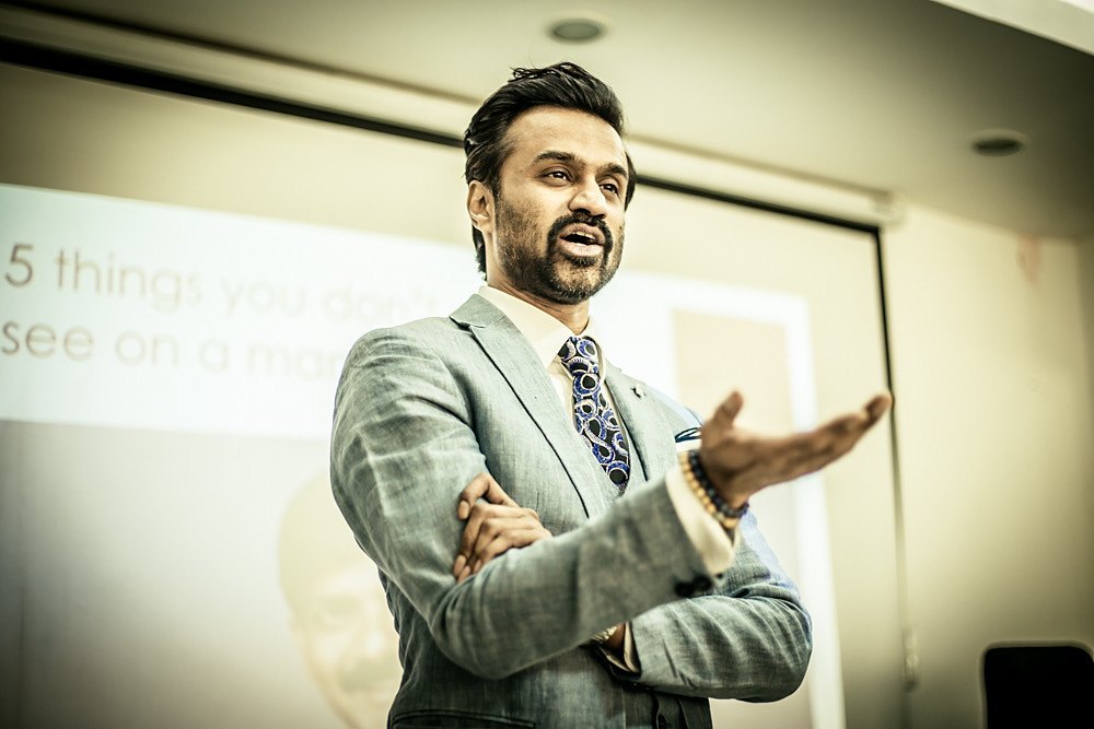 Dr Neel Reddy teaching a group