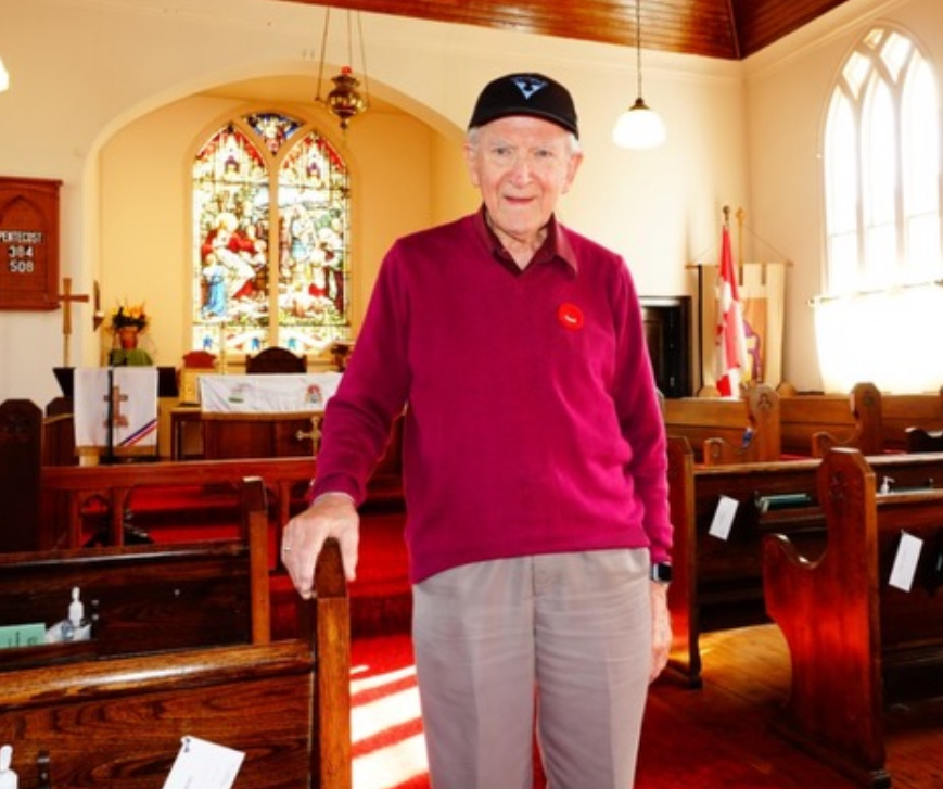 Church member inside St. John's Nelson Anglican Church in Burlington