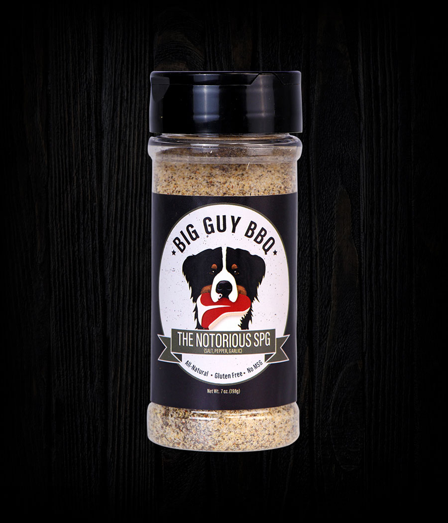 Backyard grill with steaks smoking