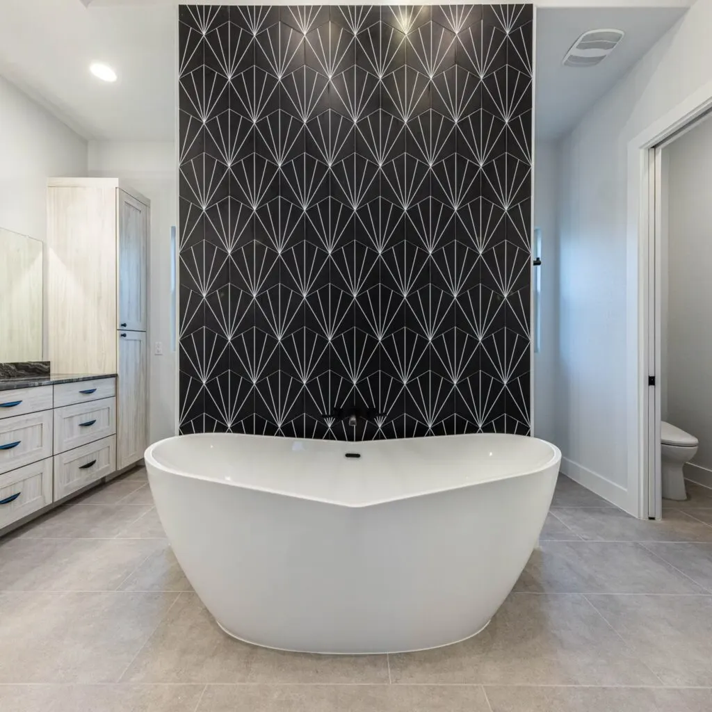 Beautiful Austin kitchen with stylish backsplash featuring subway and mosaic tiles in earthy tones, natural lighting, and modern finishes