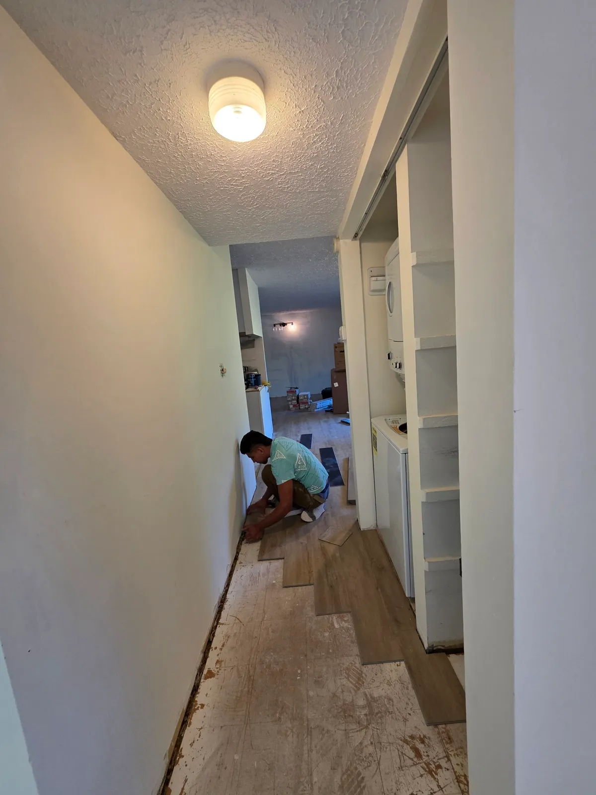 Beautiful hardwood flooring installation in Oakton VA showcasing rich oak tones, elegant baseboards, and stylish decor.