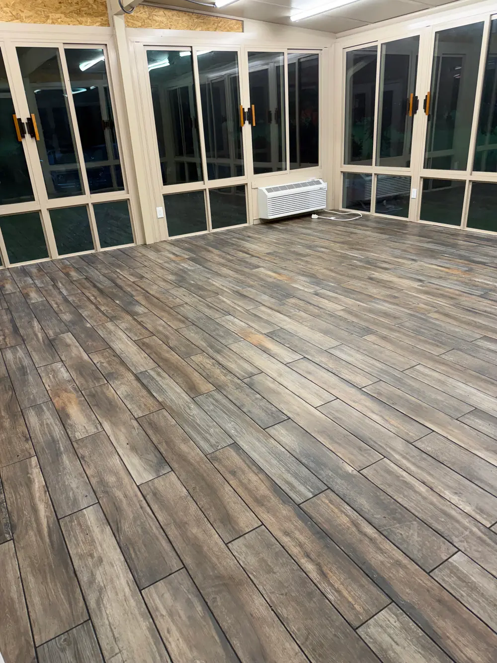 Flooring installation in Kenosha, WI showcasing hardwood and carpet options.