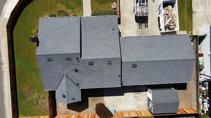 Modern commercial building in Modesto with a sleek metal roof showcasing reflective panels and precise craftsmanship