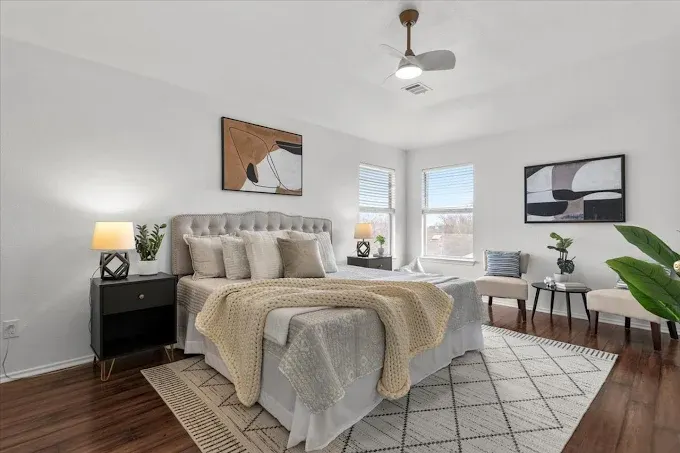Remodeled Austin kitchen with granite countertops, stainless steel appliances, custom cabinetry, and natural light.