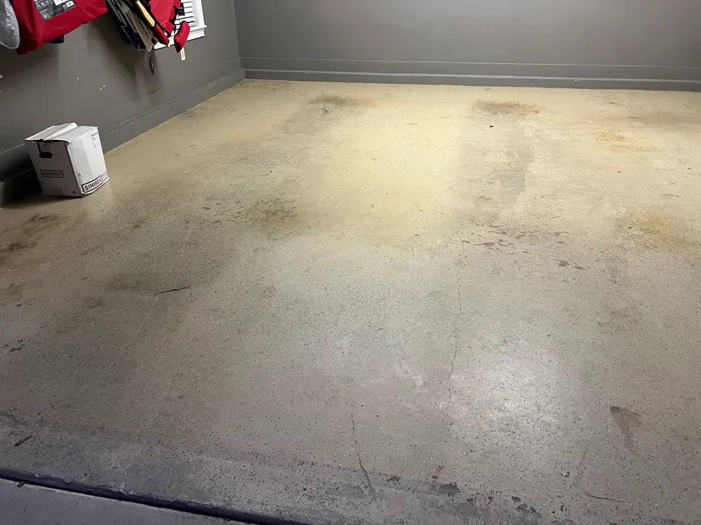Freshly patched concrete surface with trowel and epoxy tools in a well-maintained Jacksonville outdoor space.