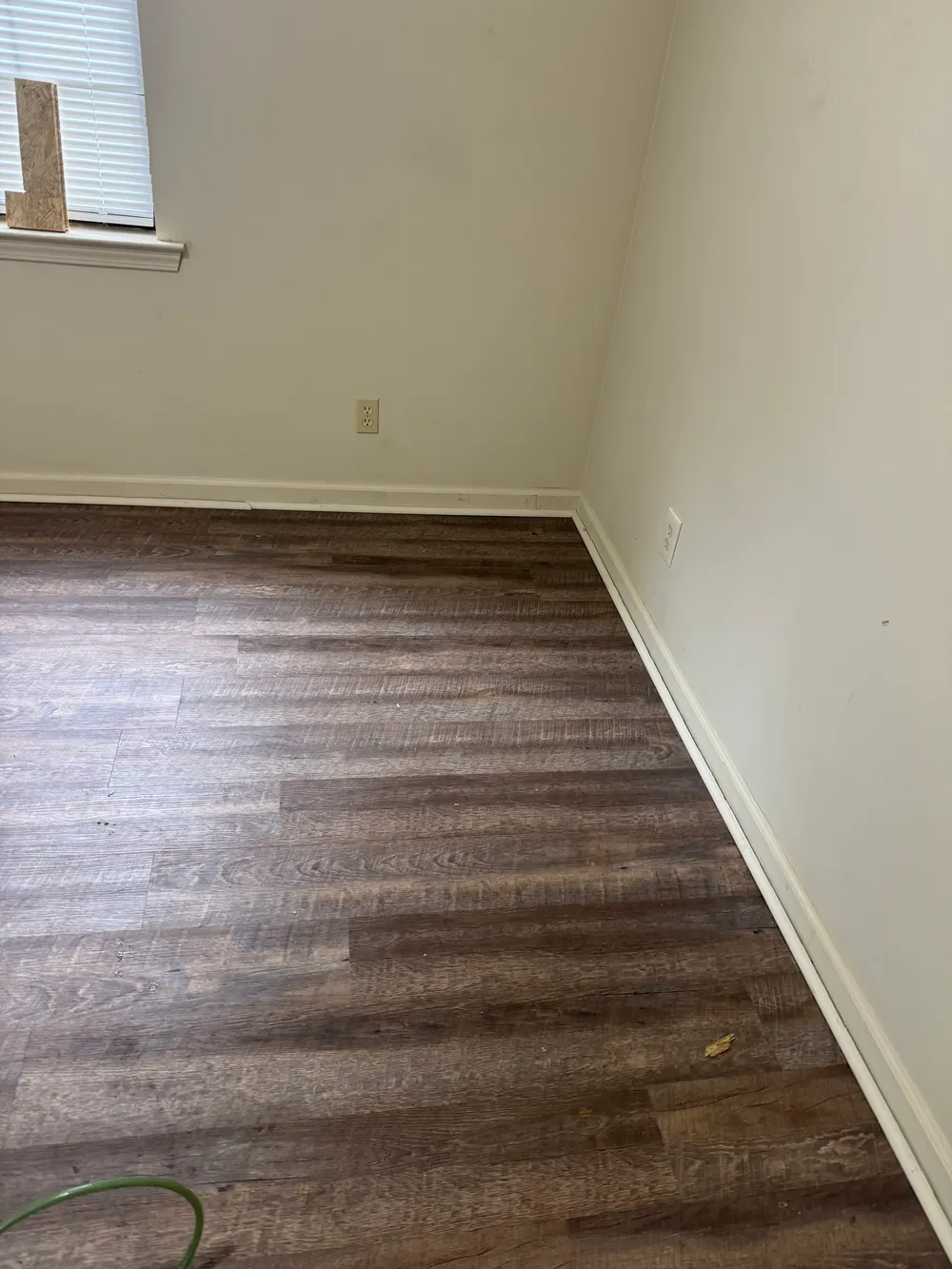Beautifully installed hardwood flooring in a modern interior with warm tones and soft ambient lighting in Cohutta GA.