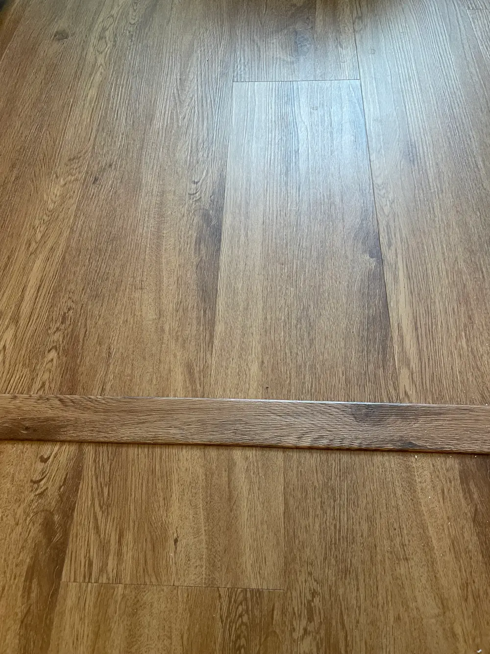 Flooring installation in a modern living room in Chicago, IL.
