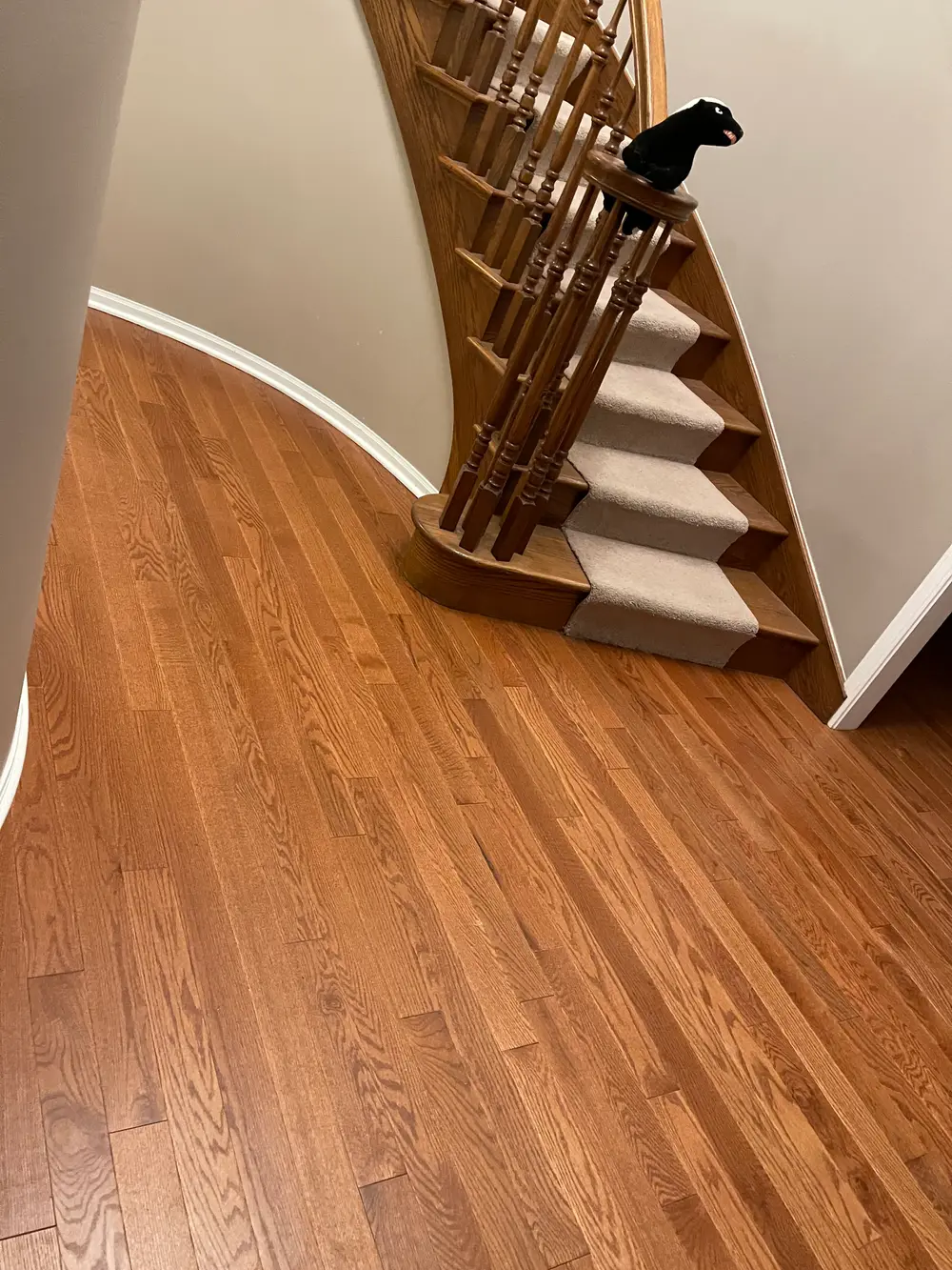 Completed floating floor installation in a stylish Darien IL living room with natural light and modern decor.