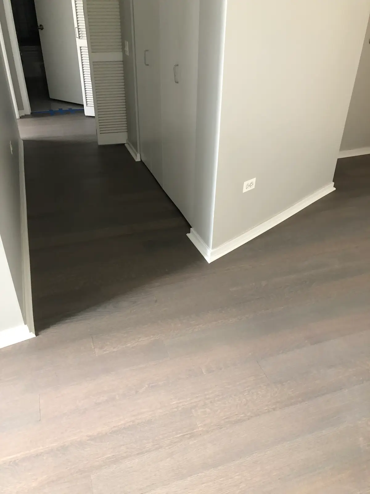Flooring in Schererville, IN showcasing modern styles and textures in a well-lit showroom.