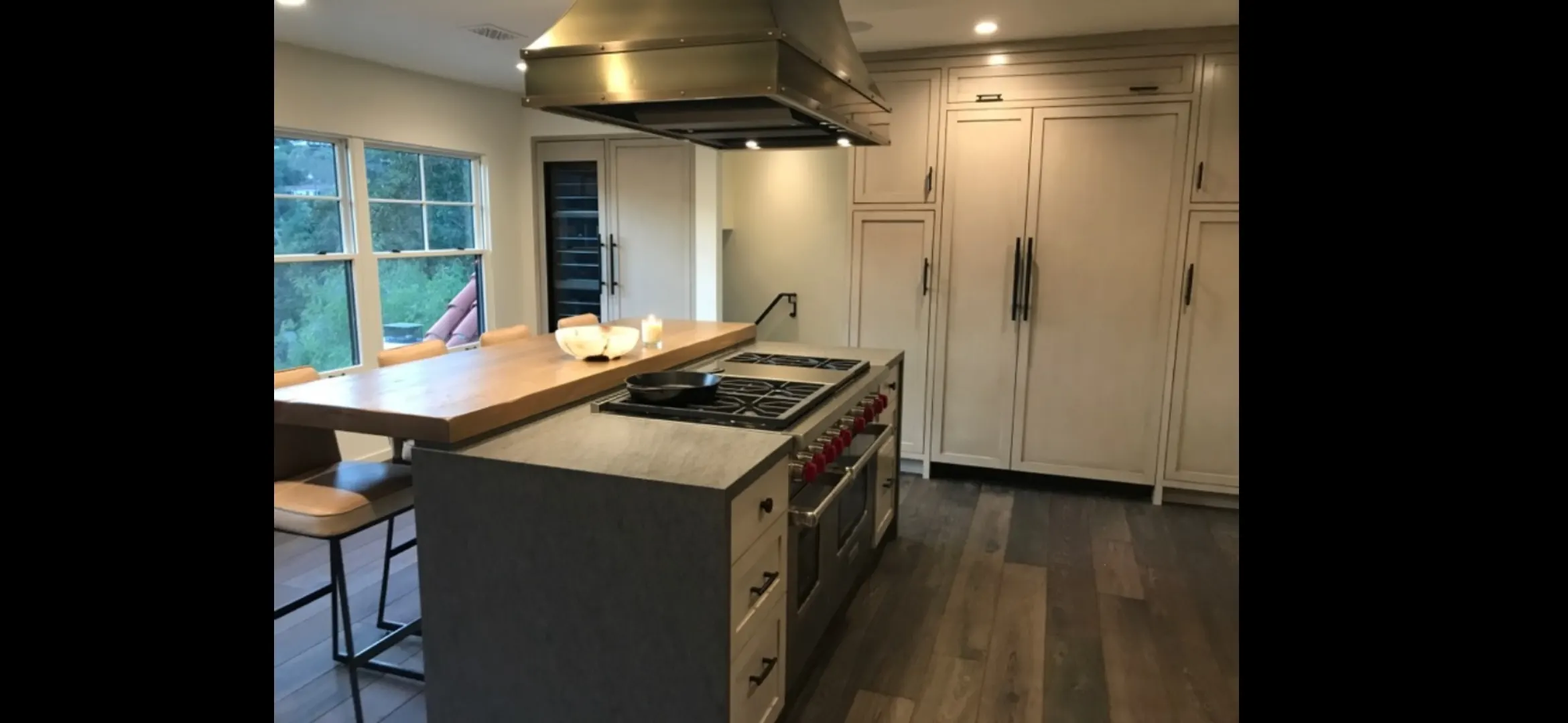 Recently remodeled kitchen in Port St. Lucie, FL, featuring quartz countertops, stainless steel appliances, and custom cabinetry.