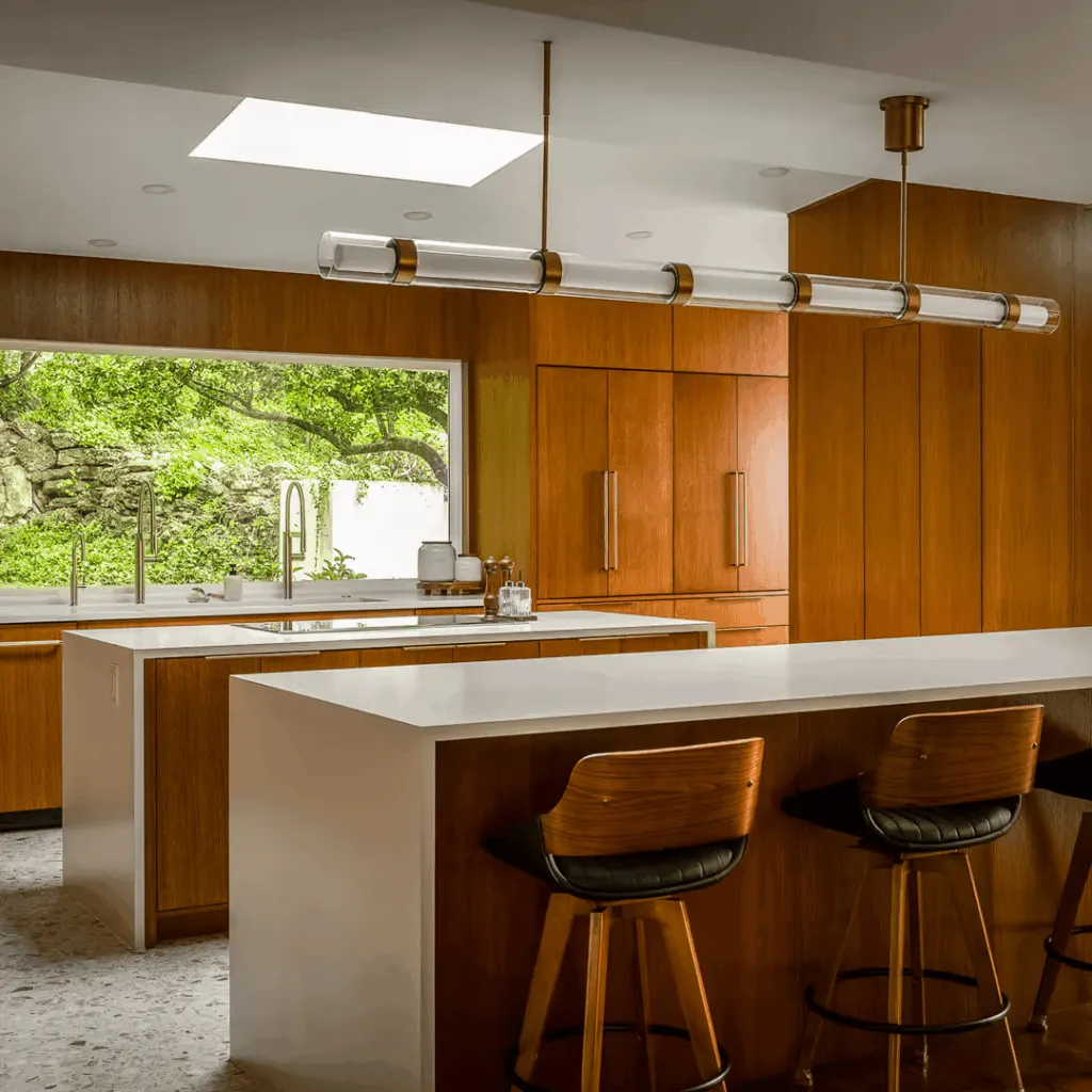Modern open-concept home in Austin featuring a sleek kitchen, spacious living area, and natural light-filled decor.