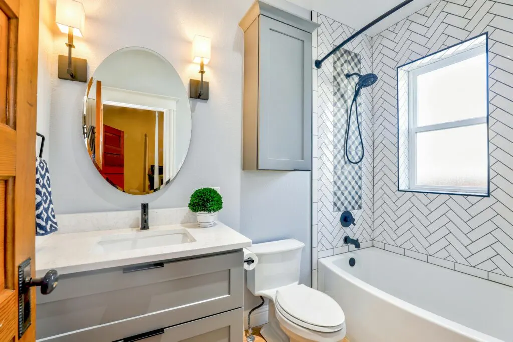 Stylish Austin kitchen with sleek tile backsplash featuring natural stone and glass, flawless grout, and modern design