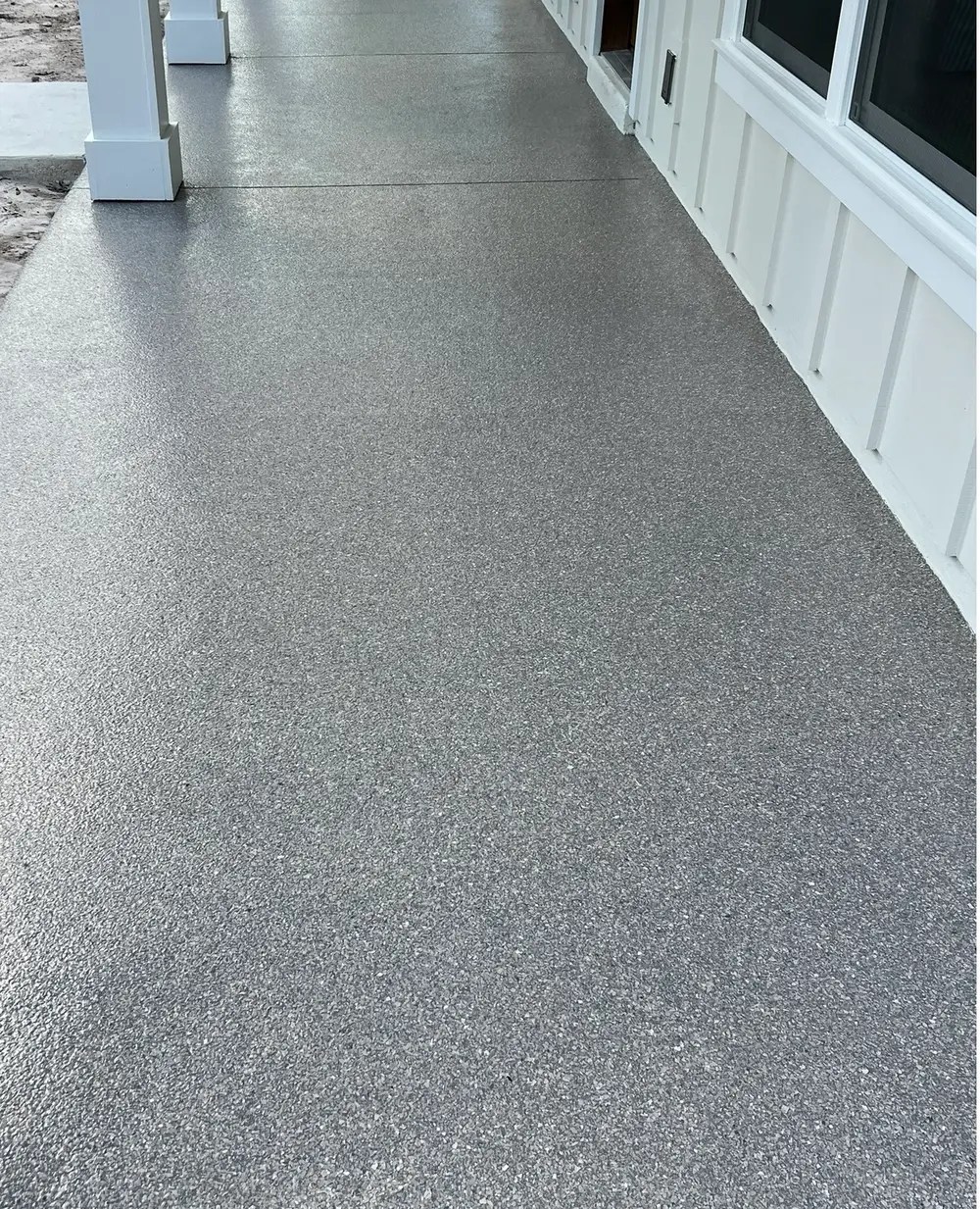 Flooring installation in a modern living room in Ormond Beach, FL.