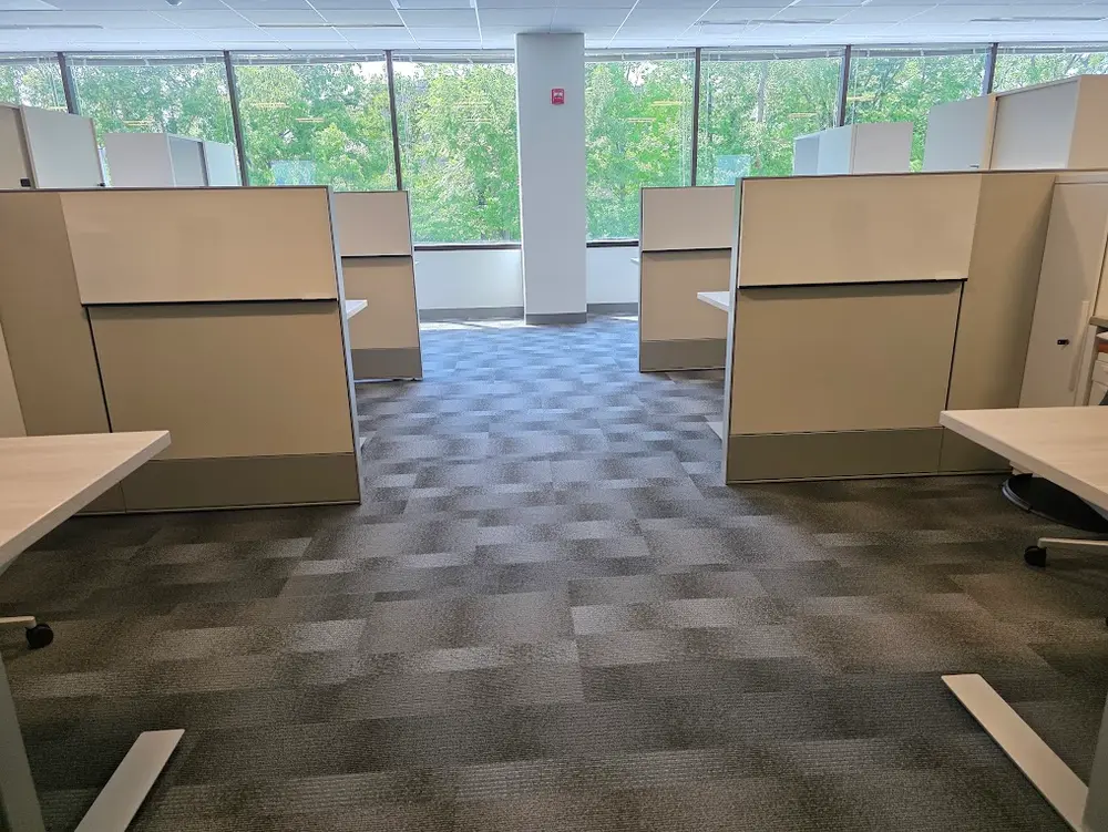 Completed Click-Lock LVP installation in Centreville VA with rich wood grain texture and elegant minimalist decor.