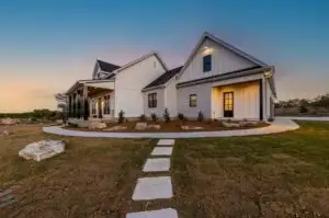 Home remodeling project in Austin, TX showcasing a modern kitchen and living space with stylish decor and finishes