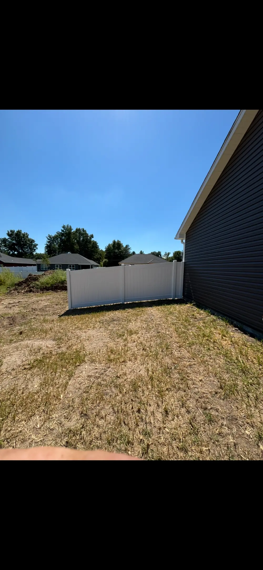 Fence removal project in Columbia, MO showcasing the before and after transformation.