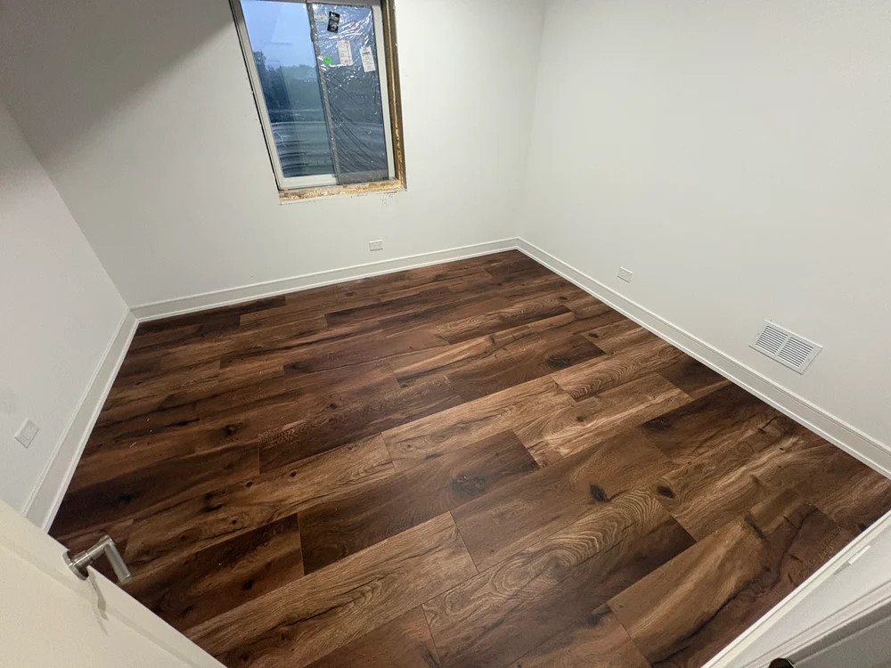 Self-Leveling Underlayment Installation in Darien IL showcasing smooth surface, precise edges, and clean interior decor.