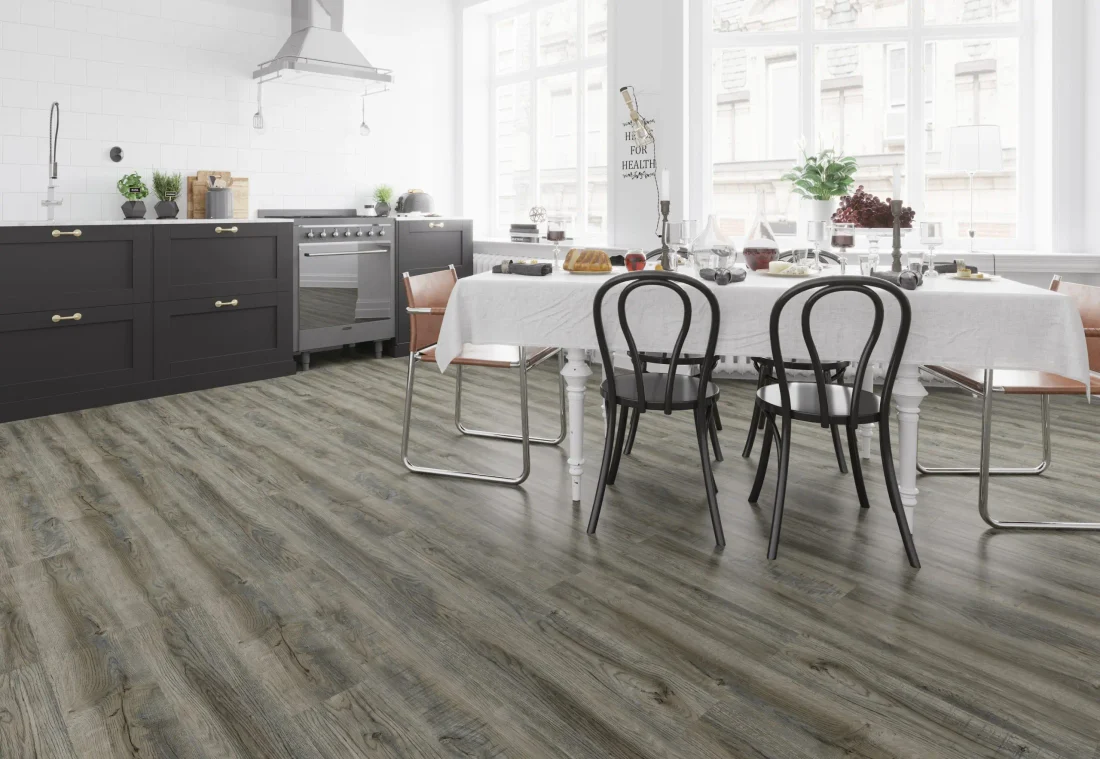 A beautifully crafted carpet with vibrant patterns and textures in a well-lit room with elegant decor.