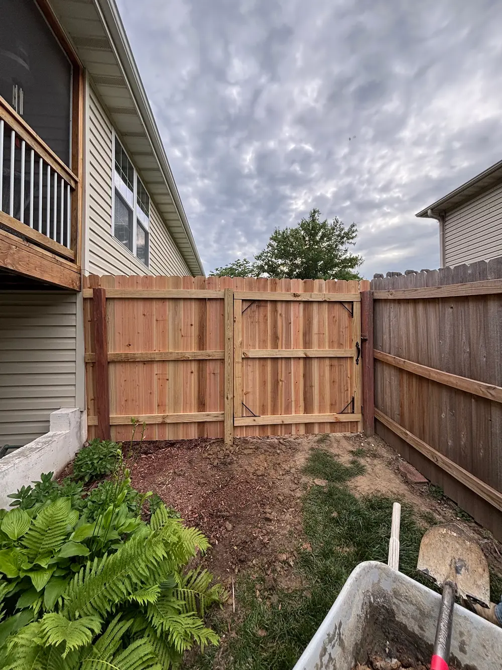 Fence installation projects in Columbia MO showcasing various styles and designs for residential properties