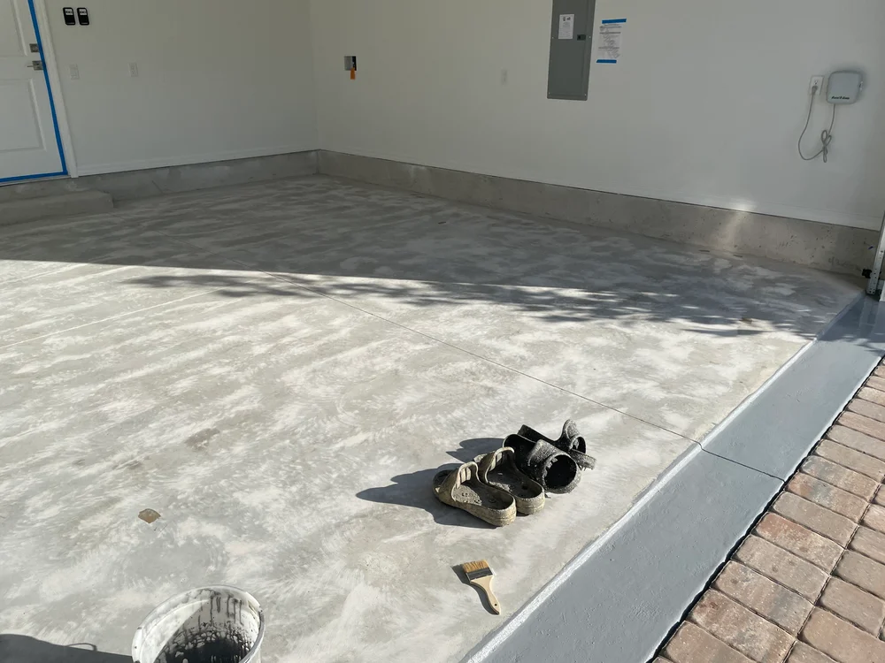 Concrete leveling for epoxy floors in Jacksonville FL featuring a glossy finish in a modern industrial workspace.