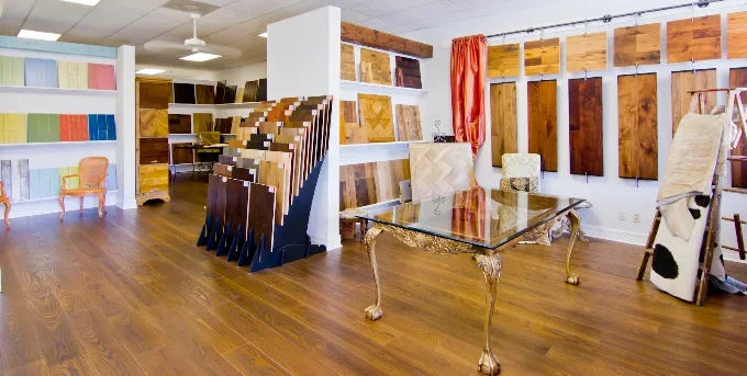 Hardwood floor gap repair in Naples FL, showcasing seamless integration and rich natural grain in a stylish living room.